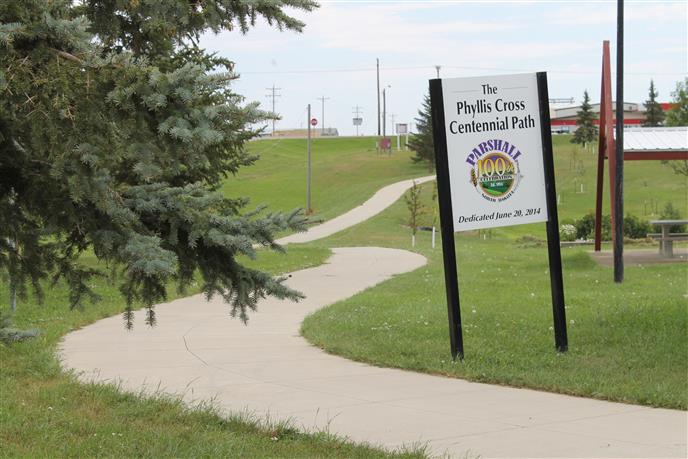 Paved walking path through Parshall, ND