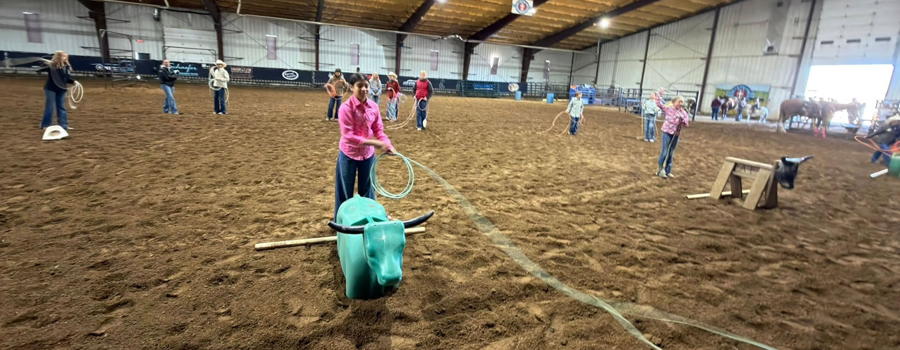 Indoor - Youth practicing roping.